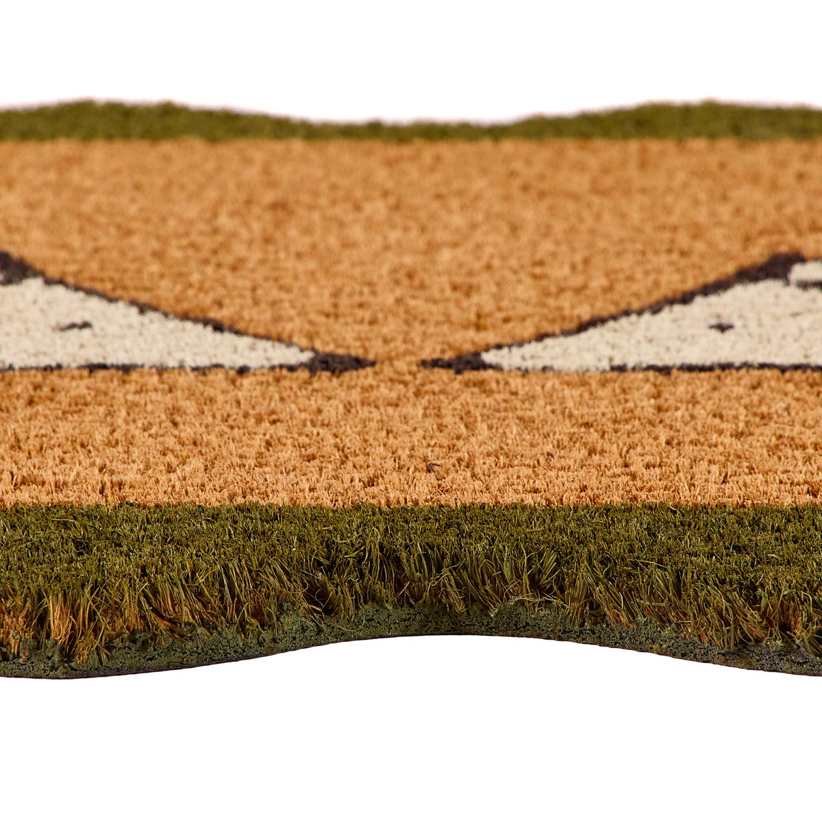 A close-up of a textured doormat with a tan and brown animal face design, featuring green borders at the top and bottom, set against a plain white background.