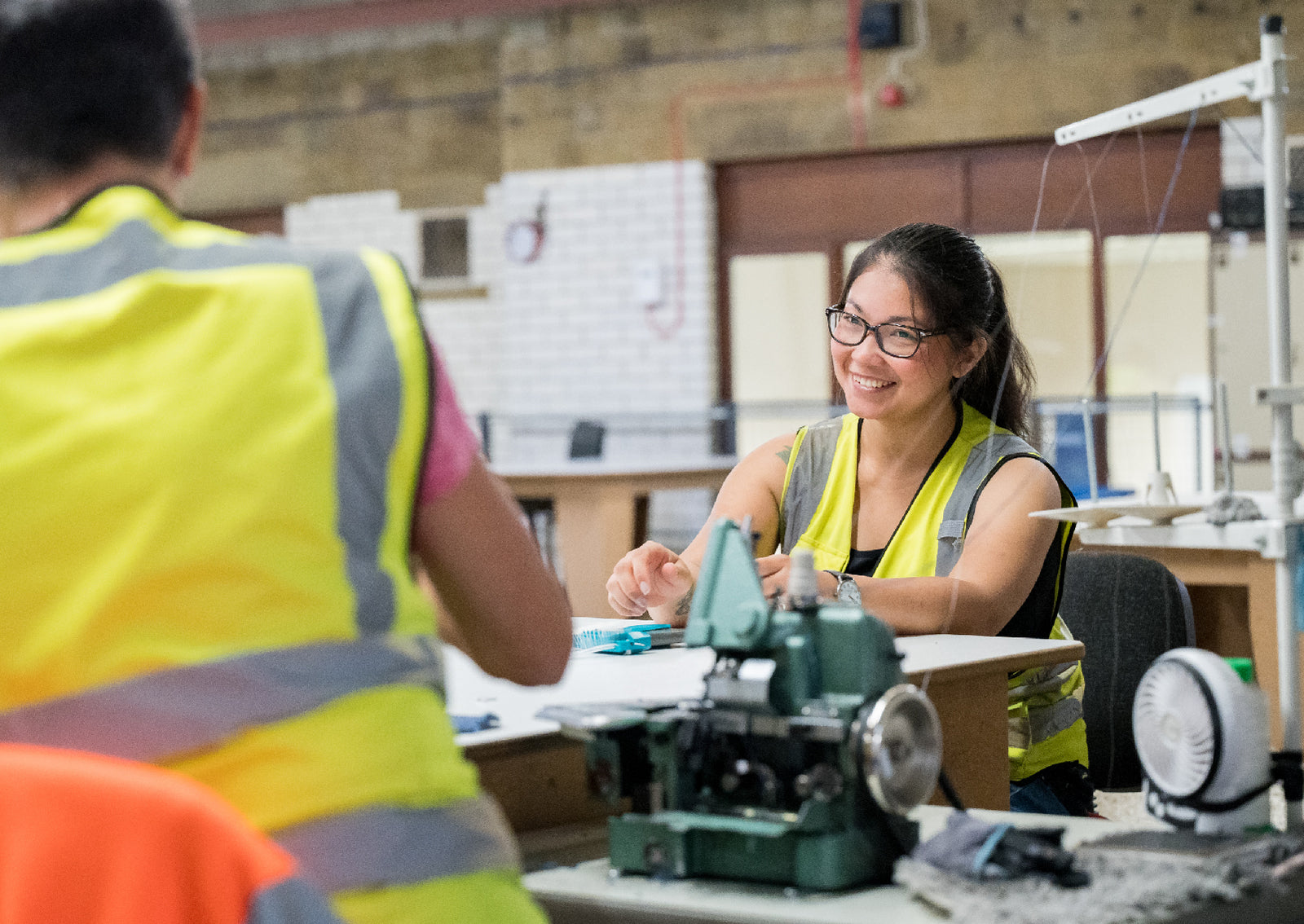 phoenox textiles employee sewing in the yorkshire mill