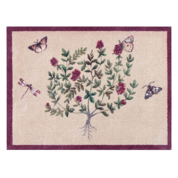 Sanderson By Highgrove x Hug Rug Thyme Walk Damson & Quince with a floral design.