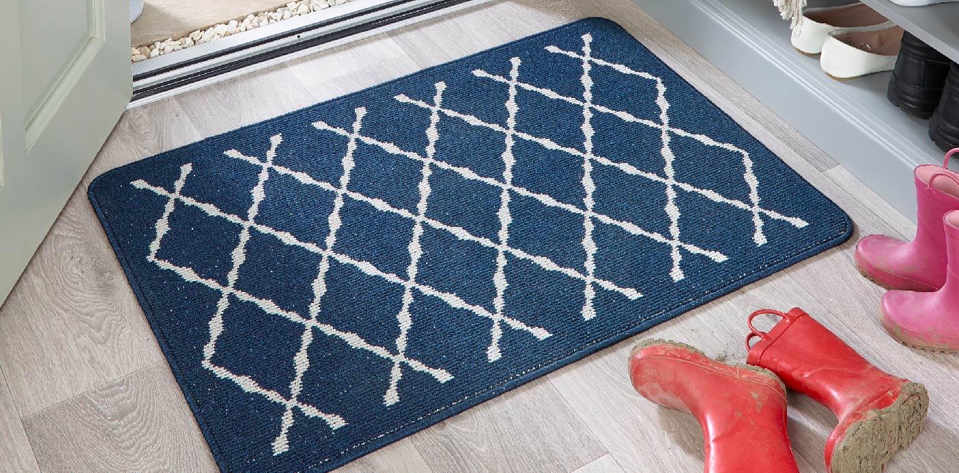 Navy blue and white utility mat from My Mat at back door